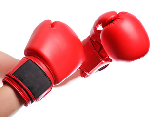 isolated hands in red boxing gloves on white background