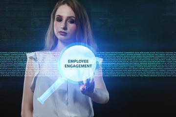 The concept of business, technology, the Internet and the network. A young entrepreneur working on a virtual screen of the future and sees the inscription: Employee engagement