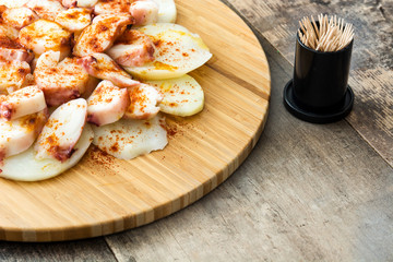 Pulpo a la gallega. Galician octopus on wood. Typical spanish food
