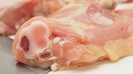 Hip Chicken cutting for cook zoom in see the detail