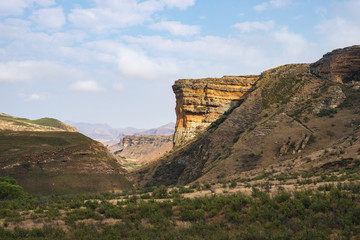 Fototapeta na wymiar Valleys, canyons and rocky cliffs at the majestic Golden Gate Highlands National Park, major travel destination and tourist attraction in South Africa.