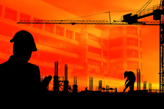 Double exposure silhouette construction engineer in the process of checking the construction site for the early morning jobs