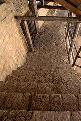 Staircase descent in the ancient limestone fortress