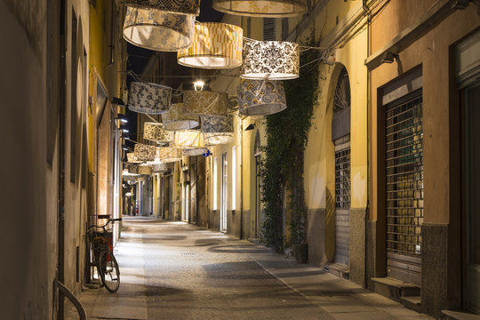 Night city Parma, Italy. Creative night lighting