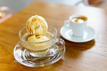 affogato with business women hand holding espresso coffee in white cup background.