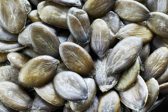 Close up picture of pumpkin seeds, shallow depth of field.