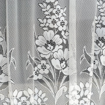 Crochet lace curtain in a Spanish window