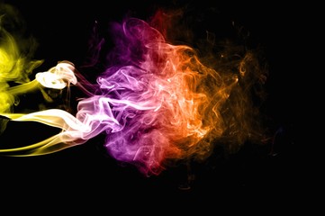 Abstract colorful smoke on black background, smoke background,colorful ink background,Yellow, Violet, Orange, Blue,beautiful color smoke