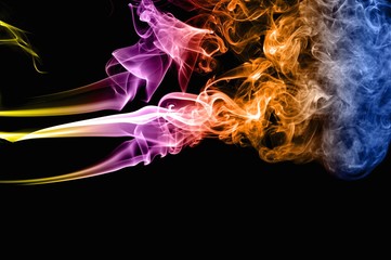 Abstract colorful smoke on black background, smoke background,colorful ink background,Yellow, Violet, Orange, Blue,beautiful color smoke