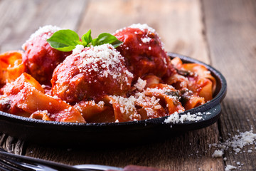 Homemade  traditional Italian pasta pappardelle with meatballs