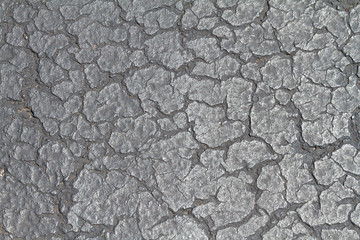 cracked dark pavement/tarmac grunge texture