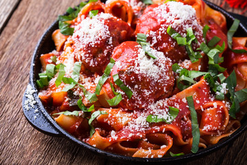 Homemade  traditional Italian pasta pappardelle with meatballs