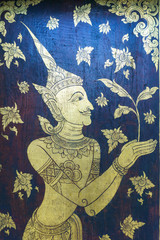 thai style painting on the old wooden door