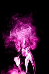 Obraz premium Abstract color smoke on black background, purple smoke background,purple ink background,Violet smoke, beautiful color smoke