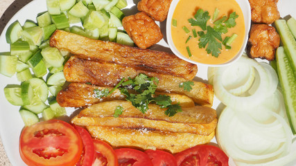 French fries with Thousand Island salad sauce and vegetable for menu