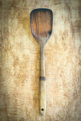 wooden spatula  on wood table background