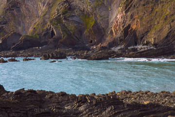 Coast of the sea with stone beds. Hartland Quay. Not far from the Hartland Point. Devon. England