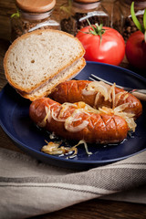 Fried sausage with onions.