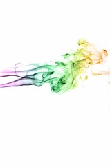 Obraz premium Abstract colorful smoke on white background, smoke background,colorful ink background,Violet, Green, Orange
