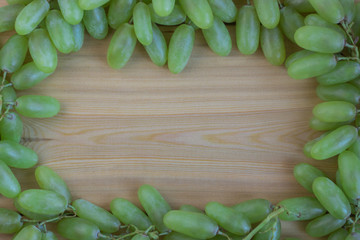 Grapes on wooden boards background. grapes Frame. Copy space