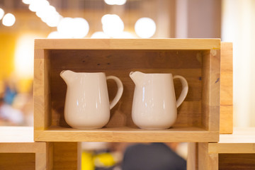 Container of Condiment Cup in wooden box