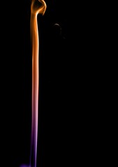 Abstract colorful smoke on black background, colorful ink background,Violet,purple, Orange, beautiful smoke