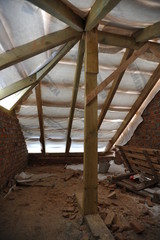 Obraz premium Mural building. Brick room. Construction waste. The process of building a residential house.