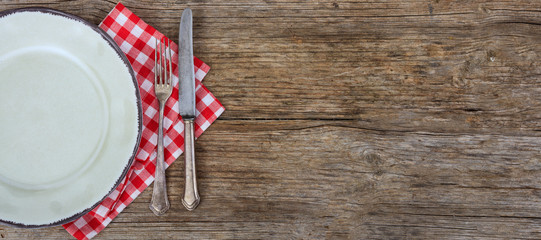 Table setting on wooden background