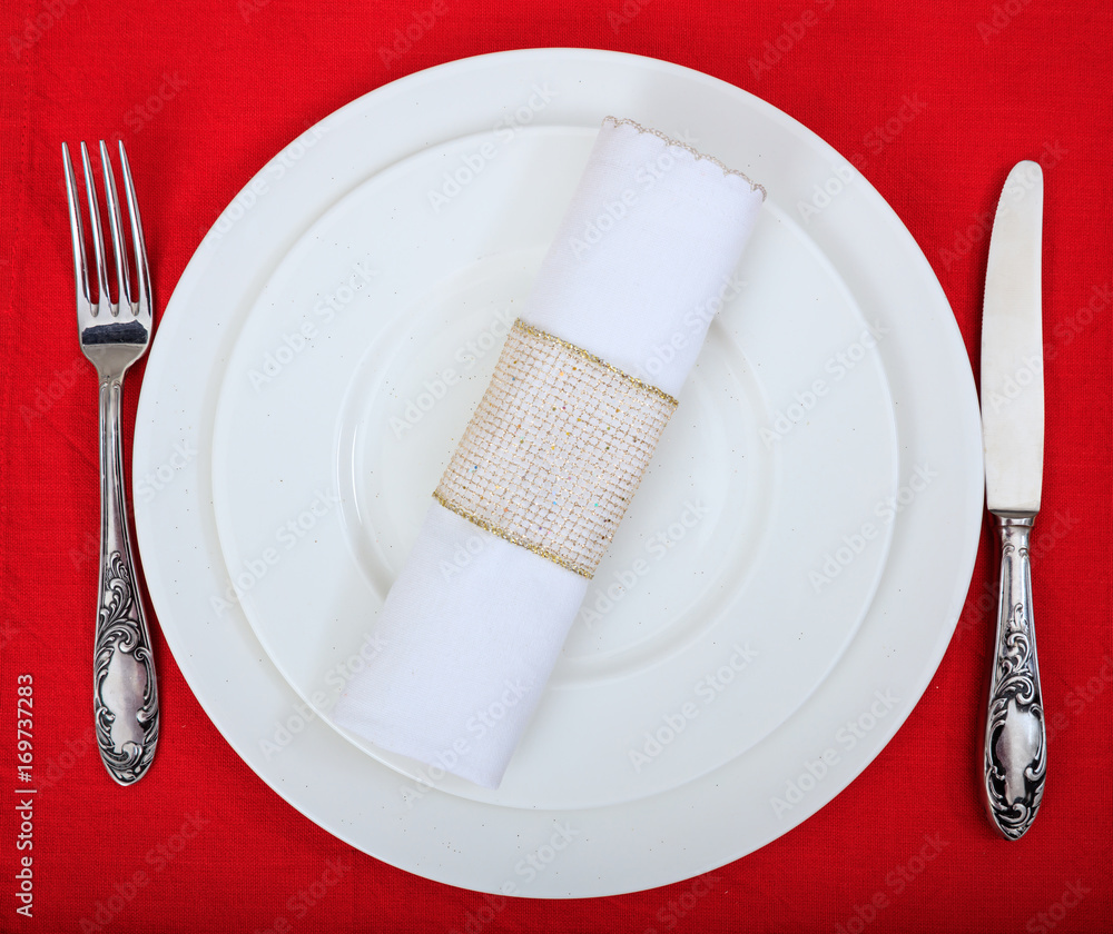 Poster formal table setting on red tablecloth