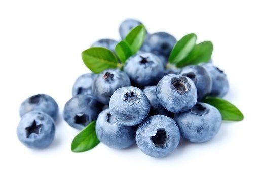 Blueberries with leaves .