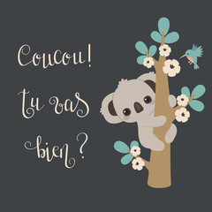 Obraz premium Koala climbing on a tree