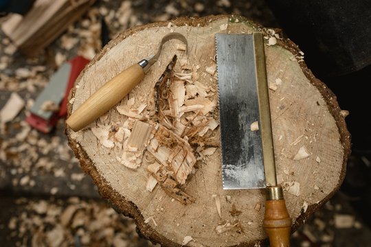 Close-up of worktool on stump