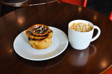 warm cup of coffee in cofee shop
