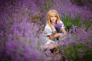 Walking girl in the field of lavender