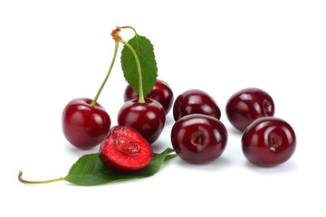 cherry with green leaf isolated on white background.