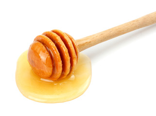 honey dipper and honey isolated on white background