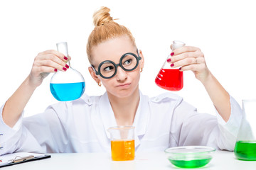 Crazy chemist with test tubes in hands, portrait isolated