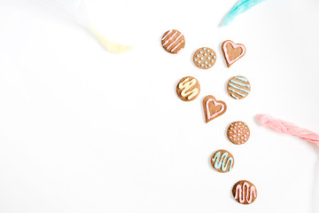 Colorful hand made cookies on white background. Flat lay, top view.