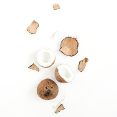 Cracked coconut on white background. Flat lat, top view © Floral Deco