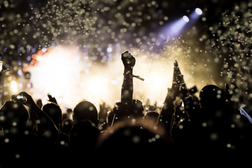 crowd with raised hands at concert - summer music festival