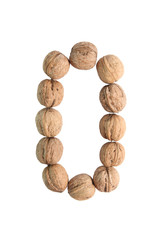 The group of walnuts on white background, making number 0. Studio shot