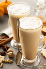 Pumpkin spice latte in tall mugs