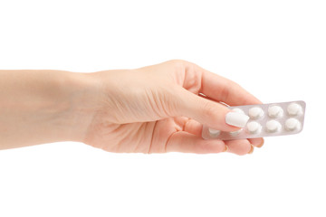 Female hands holding a pills