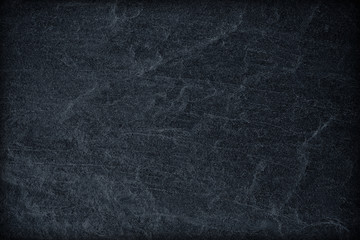 Dark grey black slate background or texture.