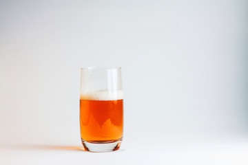 Fototapeta na wymiar glass of beer isolated on white background