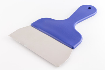 Spatula or Cake scraper for scraping fondant or icing on cake pastry of pie isolated on white...
