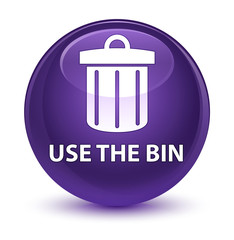 Use the bin (trash icon) glassy purple round button