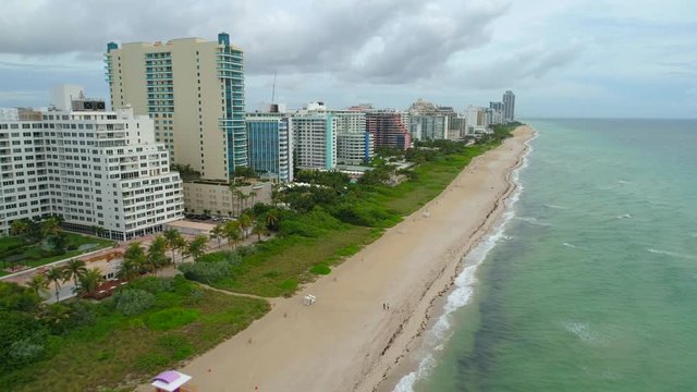 Aerial Miami Beach oceanfront condominium apartments 4k 60p