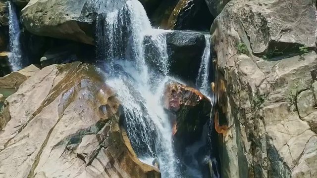 Closeup Wonderful Foamy Waterfall Torrents along Huge Rocks