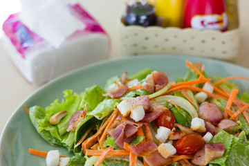 bacon salad with mix of crisp and sweet lettuce leaves
